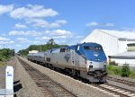 Amtrak P42 # 125 pushes the two car Shuttle Train # 464 out of the station toward its next stop of Hartford. Soon it will throttle up to 110 mph, the fastest speed allowed on the Springfield Line.